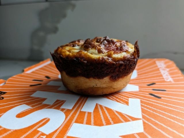 Side-view of a Cross-section of a Little Caesars Pepperoni Crazy Puffs.